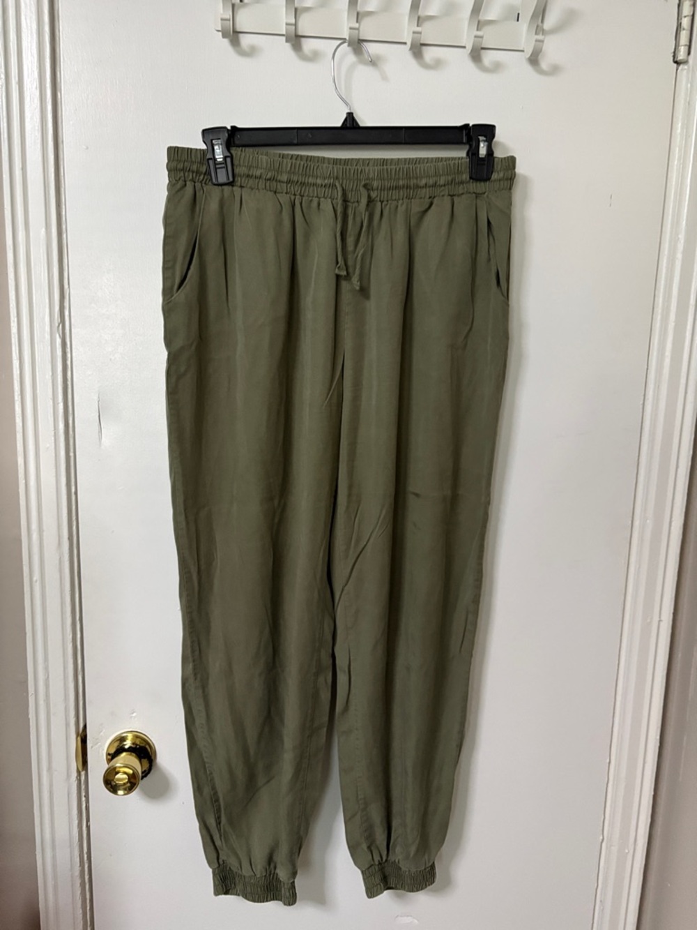 Women’s Olive Drawstring Jogger Pants with Elastic Cuffs and Waist.